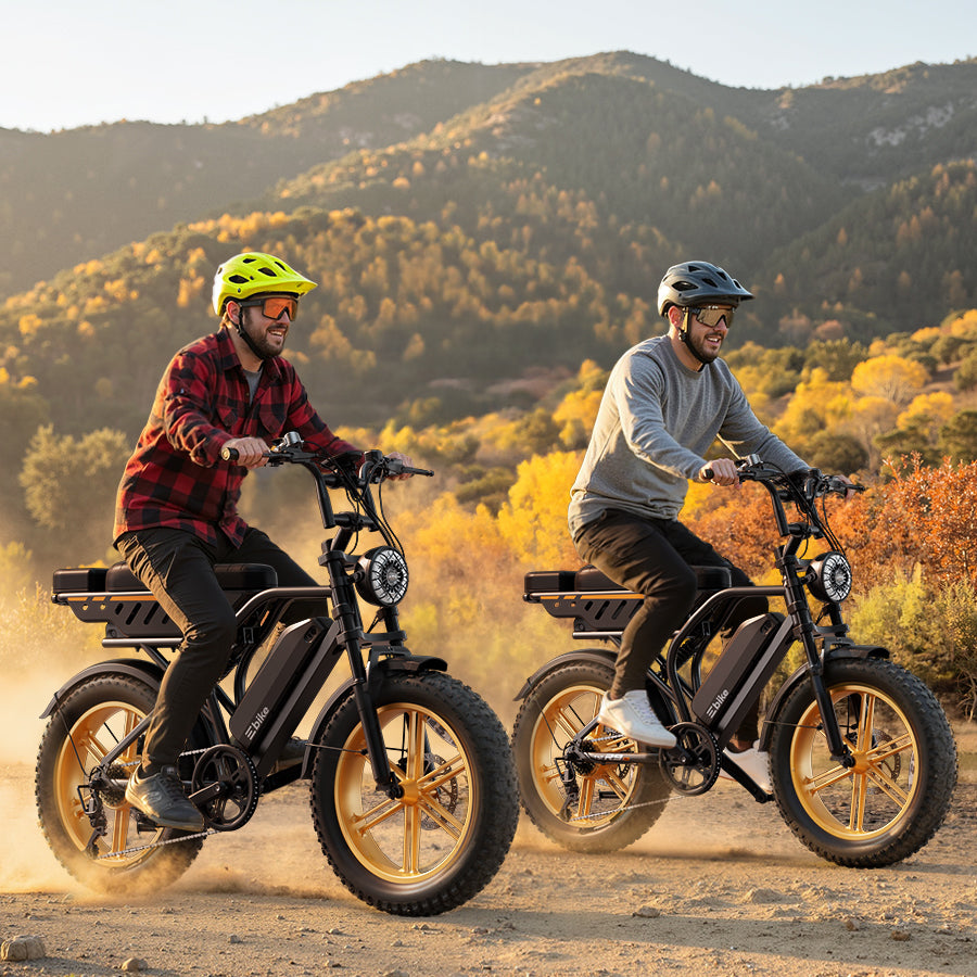 Dos personas montando bicicletas eléctricas fat bike en un camino de montaña
